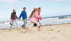 family-on-the-beach-winter-family-vacations