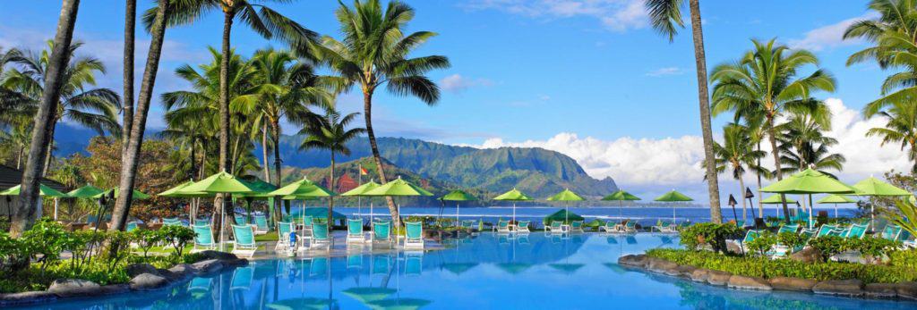 Pool at Princeville Resort with palm trees in Kauai Hawaii