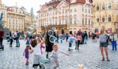 Street artists in Prague Old Town Staromestske Namesti square with bubbles