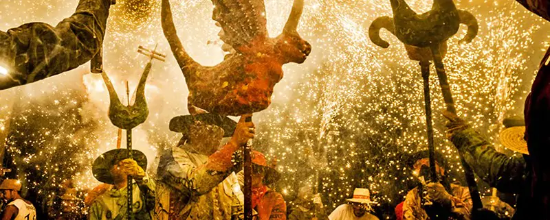 Correfocs or fire-runs during the Santa Tecla Festival in Sitges Catalonia Spain