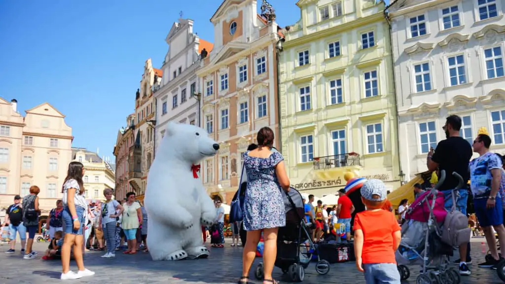 People surrounding ice bear at Old Town Square in Prague, Czech Republic