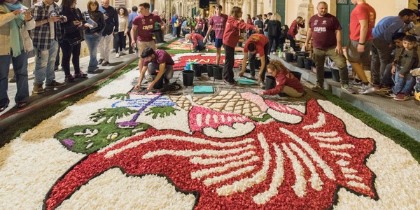 Men working at the Flower Festival in Noto, Sicily, Italy - Infiorata
