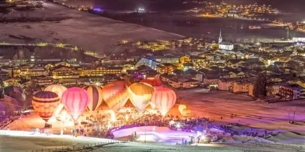 Night view of a hot air balloon event in Kaprun, Austria
