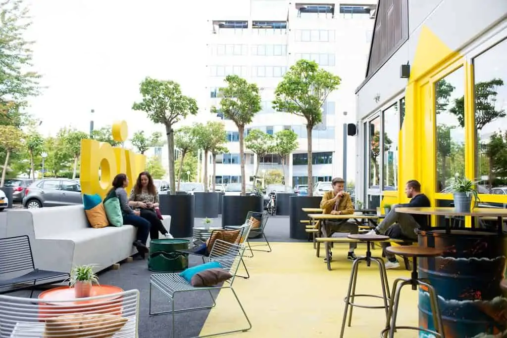 People chatting on the roof terrace at via Amsterdam hotel in Diemen
