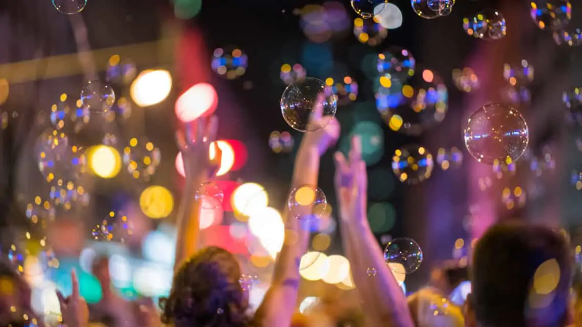 Kids playing with soap bubbles at a family festival in Germany