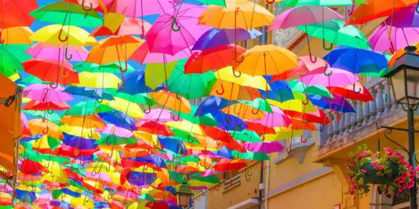 Umbrellas hanging over a street in Portugal for shade